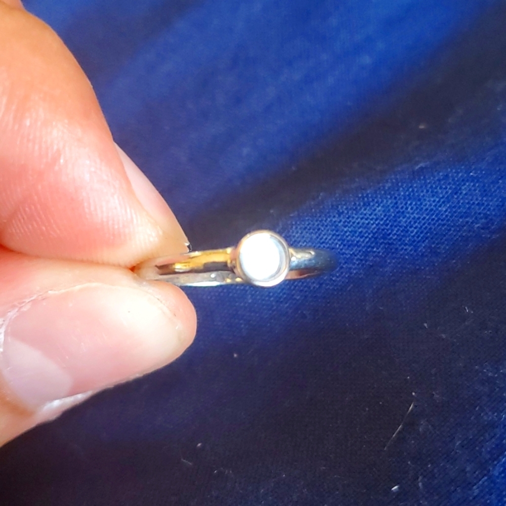 Silver opal ring.